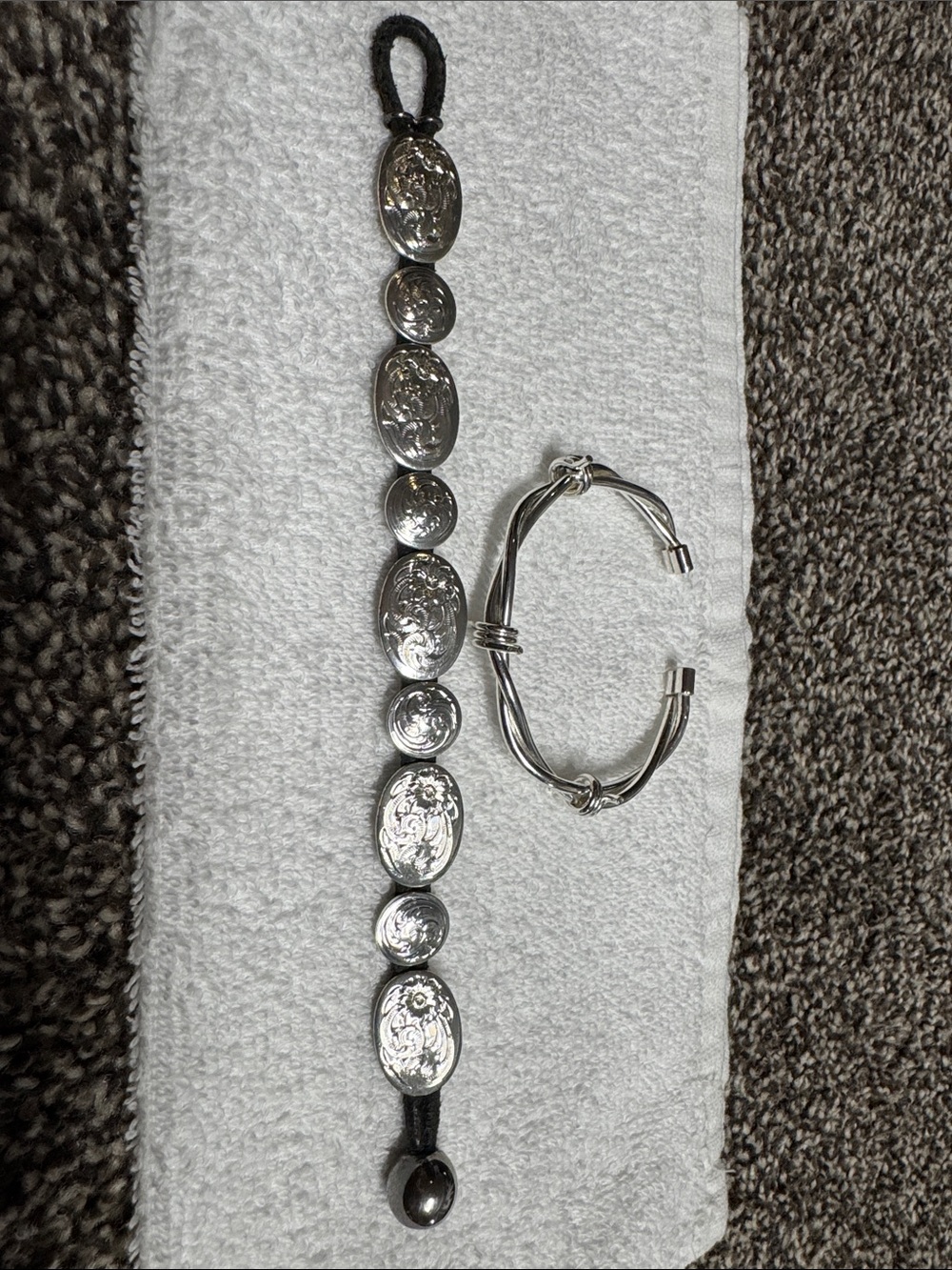 Montana Silversmiths Silver Floral Medallion Bracelet and barbed wire bracelet